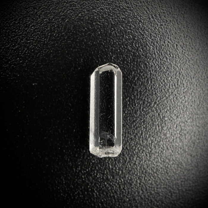 0.595 carat Burmese phenakite drill bit crystal for sale, glass clear, natural termination available at sanctuaryofstones.com photo 7