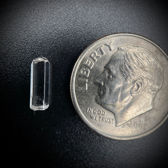 0.595 carat Burmese phenakite drill bit crystal for sale, glass clear, natural termination available at sanctuaryofstones.com photo 8