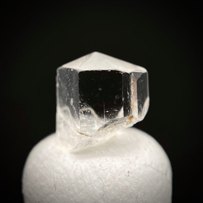 0.615 carat Burmese phenakite drill bit crystal for sale, glass clear, natural termination available at sanctuaryofstones.com photo 3