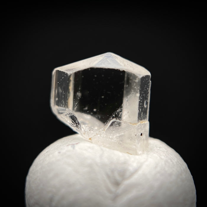 0.615 carat Burmese phenakite drill bit crystal for sale, glass clear, natural termination available at sanctuaryofstones.com photo 4