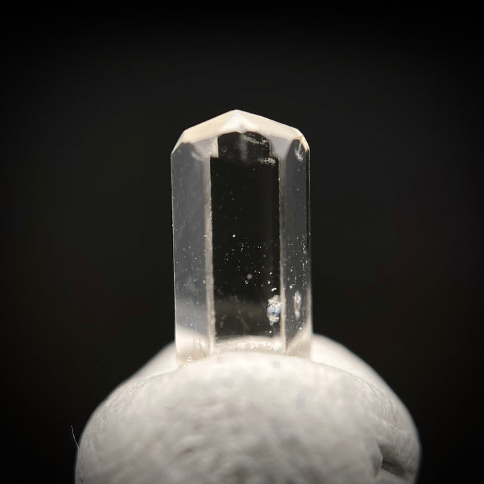 0.665 carat Burmese phenakite drill bit crystal for sale, glass clear, natural termination available at sanctuaryofstones.com photo 4