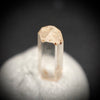 0.25 carat Burmese phenakite drill bit crystal for sale, glass clear, natural termination available at sanctuaryofstones.com photo 8