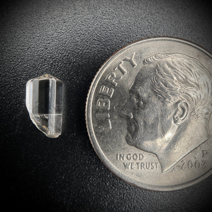 0.705 carat Burmese phenakite drill bit crystal for sale, glass clear, natural termination available at sanctuaryofstones.com photo 2