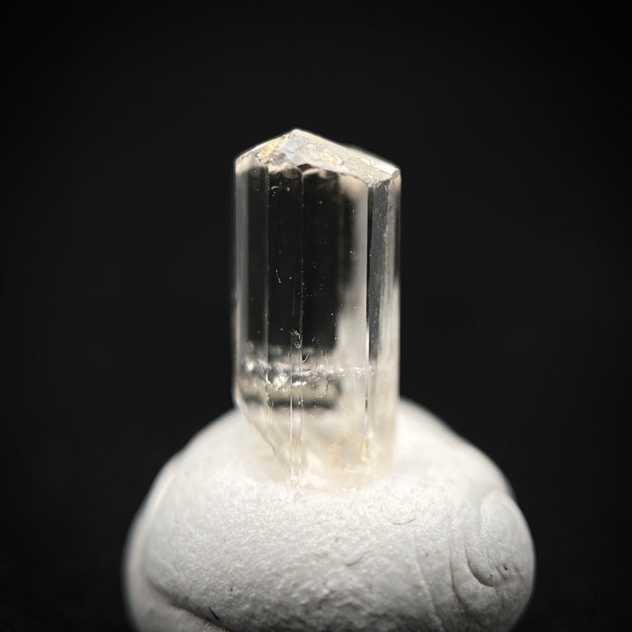 0.705 carat Burmese phenakite drill bit crystal for sale, glass clear, natural termination available at sanctuaryofstones.com photo 4