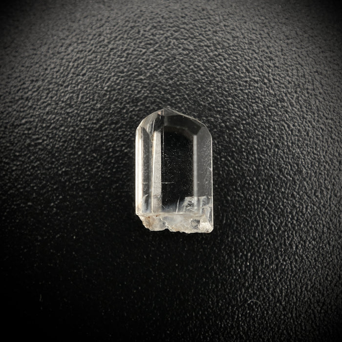 0.72 carat Burmese phenakite drill bit crystal for sale, glass clear, natural termination available at sanctuaryofstones.com photo 1
