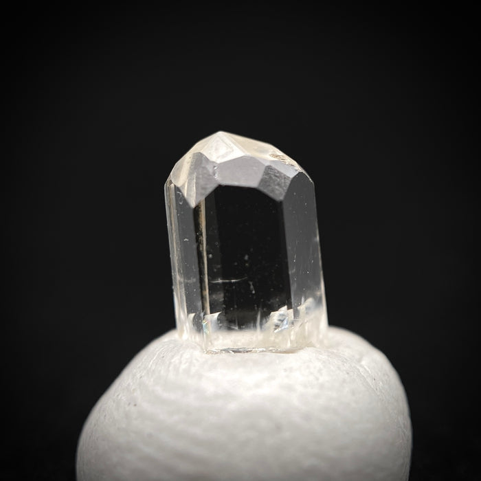 0.72 carat Burmese phenakite drill bit crystal for sale, glass clear, natural termination available at sanctuaryofstones.com photo 3