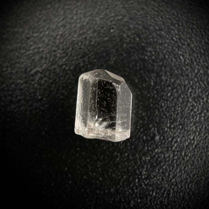 0.725 carat Burmese phenakite drill bit crystal for sale, glass clear, natural termination available at sanctuaryofstones.com photo 1
