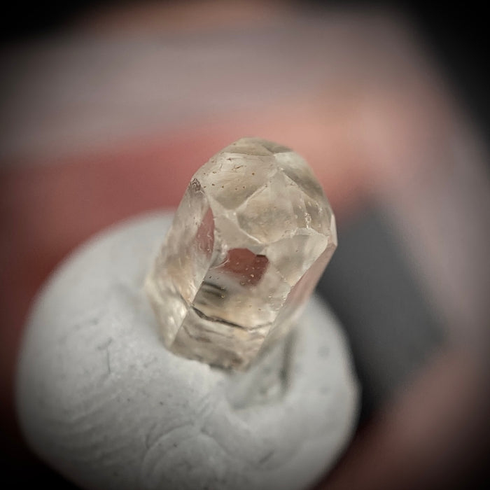 0.725 carat Burmese phenakite drill bit crystal for sale, glass clear, natural termination available at sanctuaryofstones.com photo 3