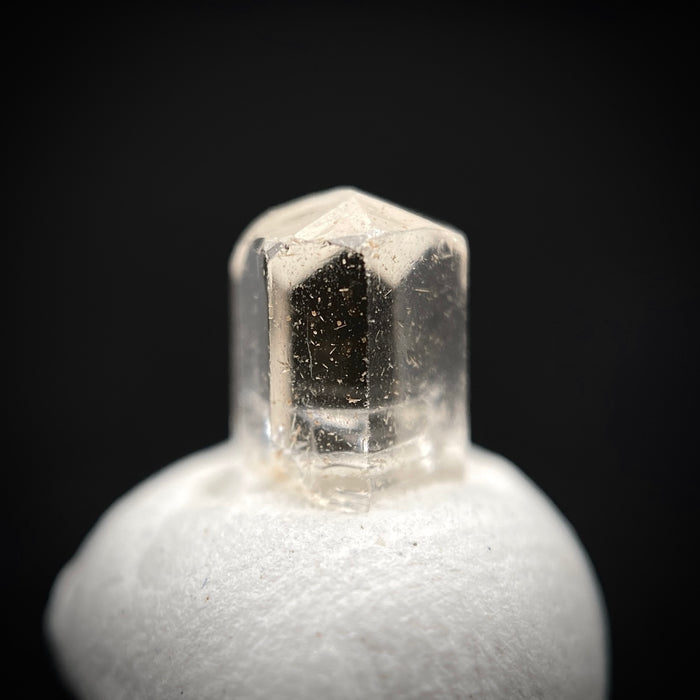 0.725 carat Burmese phenakite drill bit crystal for sale, glass clear, natural termination available at sanctuaryofstones.com photo 4