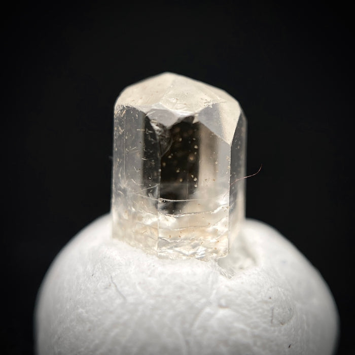 0.725 carat Burmese phenakite drill bit crystal for sale, glass clear, natural termination available at sanctuaryofstones.com photo 6