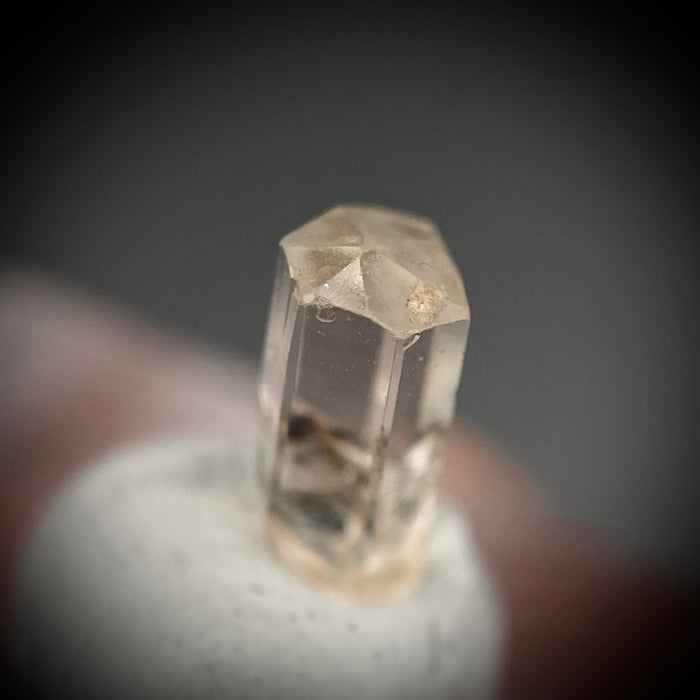 0.725 carat Burmese phenakite drill bit crystal for sale, glass clear, natural termination available at sanctuaryofstones.com photo 3