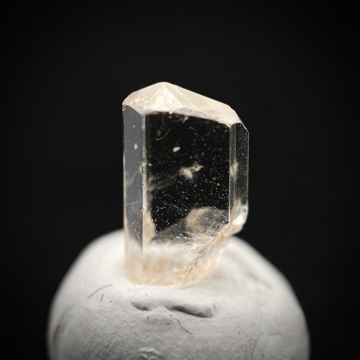 0.725 carat Burmese phenakite drill bit crystal for sale, glass clear, natural termination available at sanctuaryofstones.com photo 4