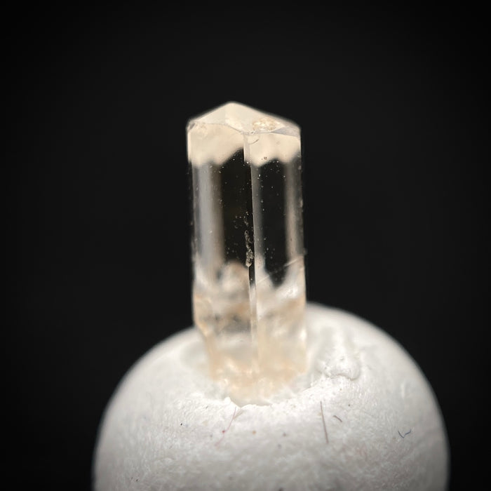 0.725 carat Burmese phenakite drill bit crystal for sale, glass clear, natural termination available at sanctuaryofstones.com photo 8