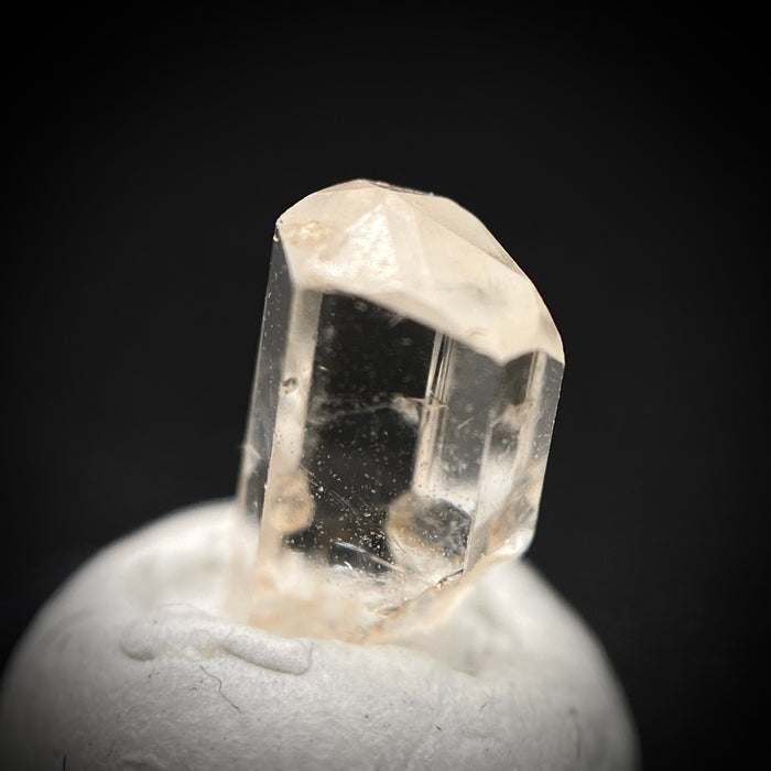 0.725 carat Burmese phenakite drill bit crystal for sale, glass clear, natural termination available at sanctuaryofstones.com photo 9