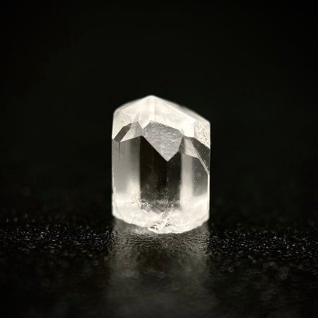 0.73 carat Burmese phenakite drill bit crystal for sale, glass clear, natural termination available at sanctuaryofstones.com photo 1