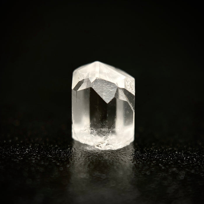 0.73 carat Burmese phenakite drill bit crystal for sale, glass clear, natural termination available at sanctuaryofstones.com photo 1