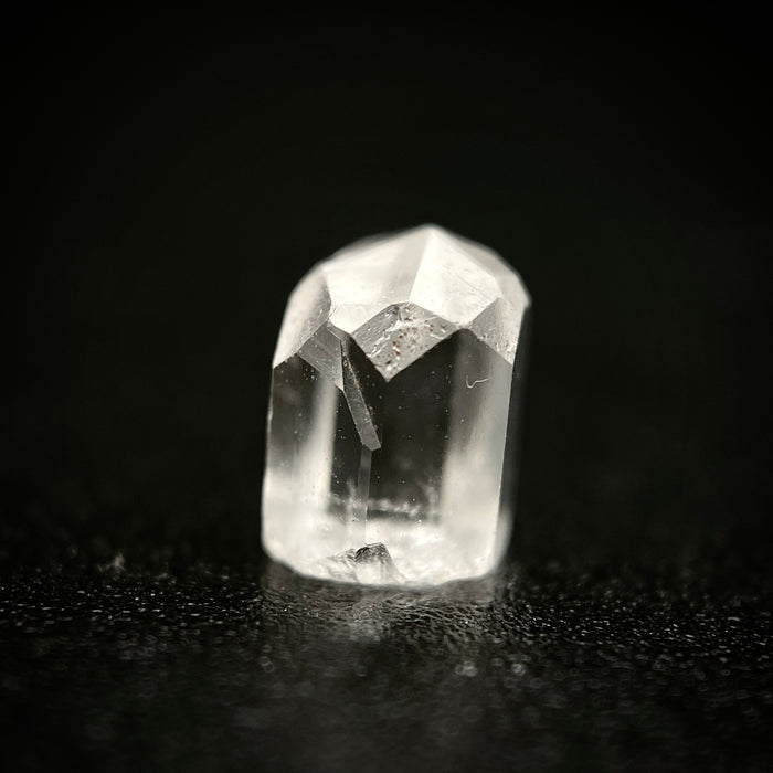 0.73 carat Burmese phenakite drill bit crystal for sale, glass clear, natural termination available at sanctuaryofstones.com photo 7