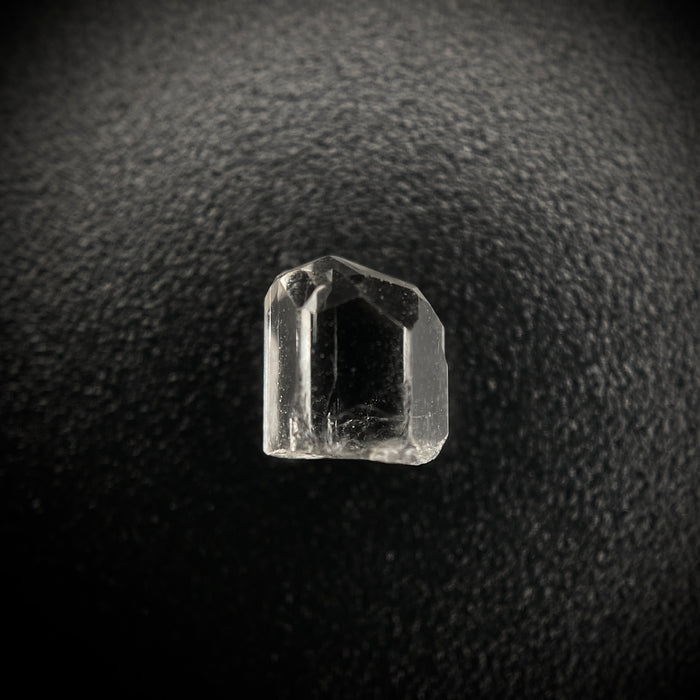 0.73 carat Burmese phenakite drill bit crystal for sale, glass clear, natural termination available at sanctuaryofstones.com photo 4