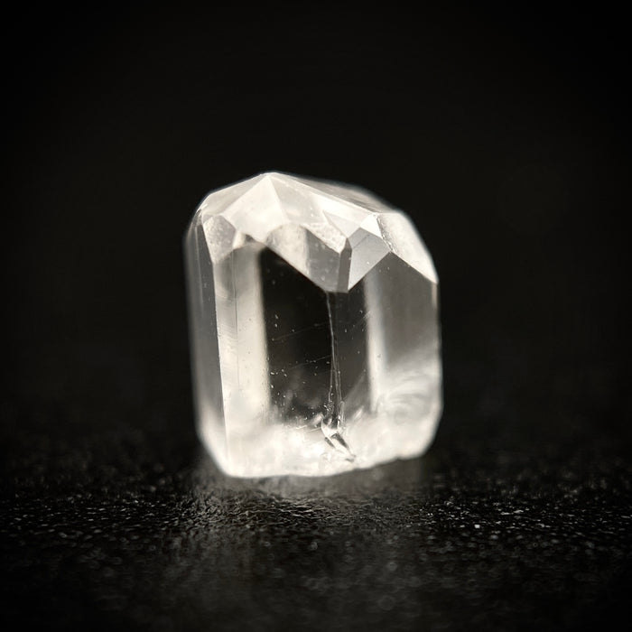 0.73 carat Burmese phenakite drill bit crystal for sale, glass clear, natural termination available at sanctuaryofstones.com photo 9