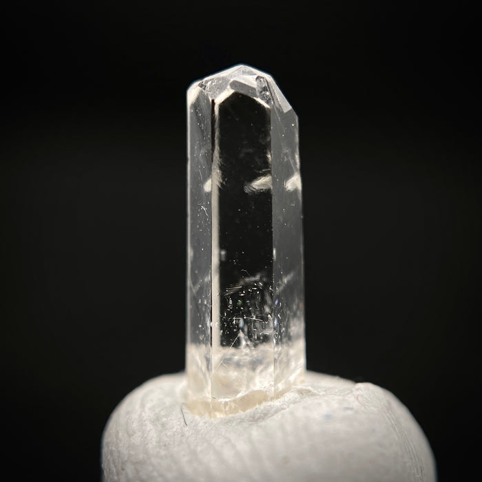 0.735 carat Burmese phenakite drill bit crystal for sale, glass clear, natural termination available at sanctuaryofstones.com photo 9