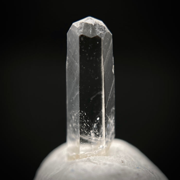0.735 carat Burmese phenakite drill bit crystal for sale, glass clear, natural termination available at sanctuaryofstones.com photo 1