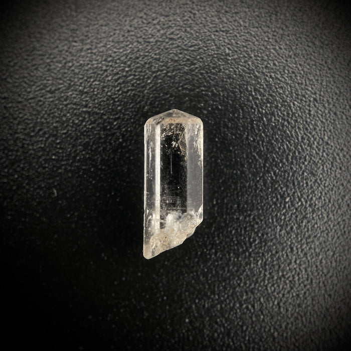 0.765 carat Burmese phenakite drill bit crystal for sale, glass clear, natural termination available at sanctuaryofstones.com photo 5
