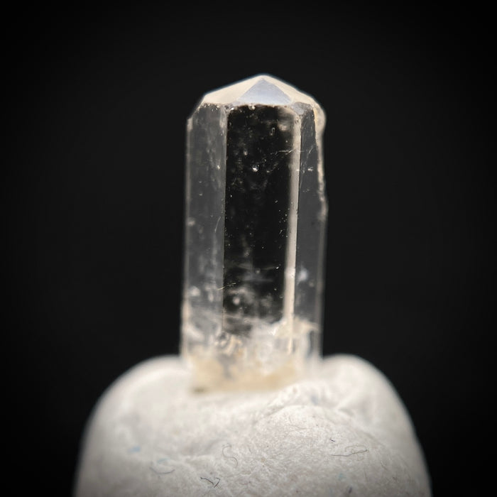 0.765 carat Burmese phenakite drill bit crystal for sale, glass clear, natural termination available at sanctuaryofstones.com photo 7