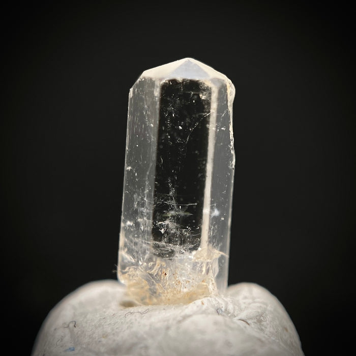 0.765 carat Burmese phenakite drill bit crystal for sale, glass clear, natural termination available at sanctuaryofstones.com photo 8