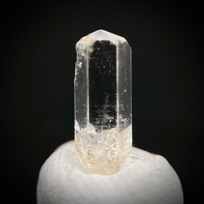 0.765 carat Burmese phenakite drill bit crystal for sale, glass clear, natural termination available at sanctuaryofstones.com photo 1