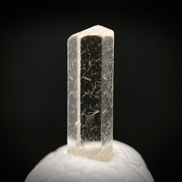 0.77 carat Burmese phenakite drill bit crystal for sale, glass clear, natural termination available at sanctuaryofstones.com photo 1
