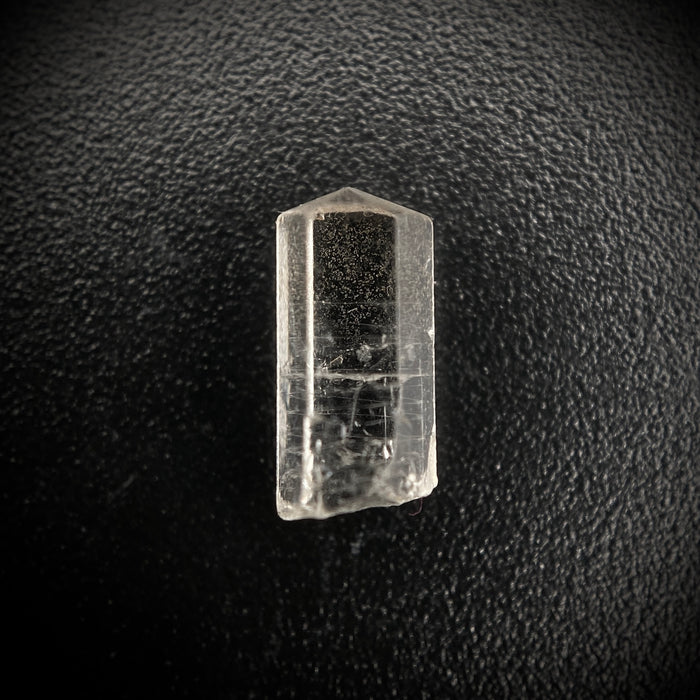 0.87 carat Burmese phenakite drill bit crystal for sale, glass clear, natural termination available at sanctuaryofstones.com photo 5