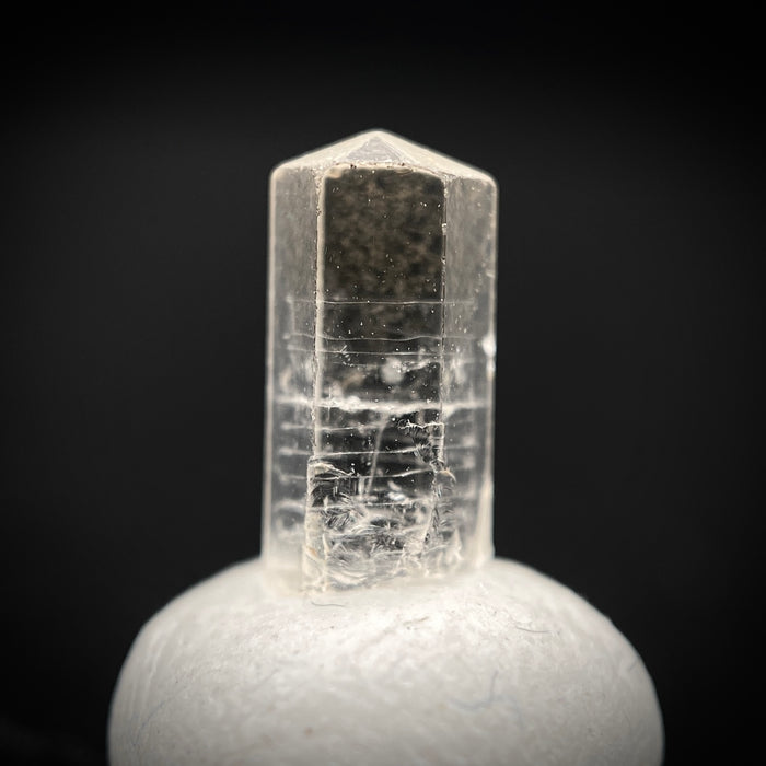 0.87 carat Burmese phenakite drill bit crystal for sale, glass clear, natural termination available at sanctuaryofstones.com photo 1