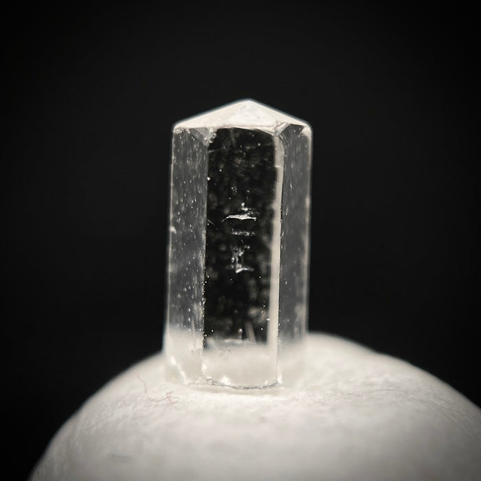 0.27 carat Burmese phenakite drill bit crystal for sale, glass clear, natural termination available at sanctuaryofstones.com photo 2