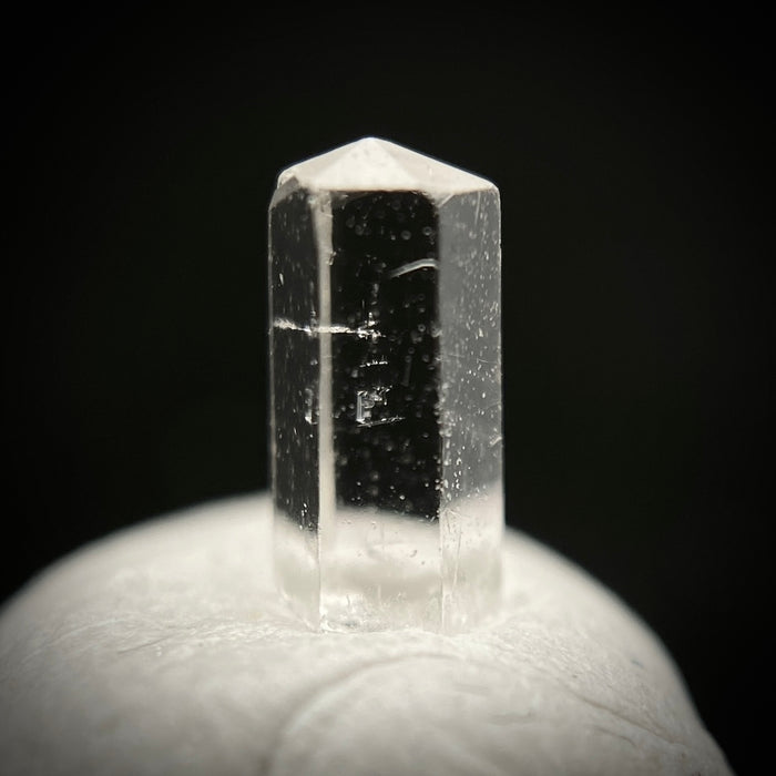 0.27 carat Burmese phenakite drill bit crystal for sale, glass clear, natural termination available at sanctuaryofstones.com photo 4