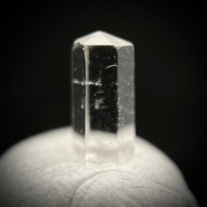 0.27 carat Burmese phenakite drill bit crystal for sale, glass clear, natural termination available at sanctuaryofstones.com photo 5