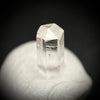 0.27 carat Burmese phenakite drill bit crystal for sale, glass clear, natural termination available at sanctuaryofstones.com photo 6