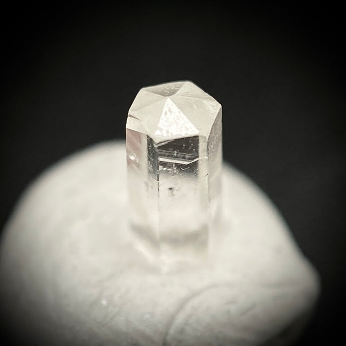 0.27 carat Burmese phenakite drill bit crystal for sale, glass clear, natural termination available at sanctuaryofstones.com photo 6