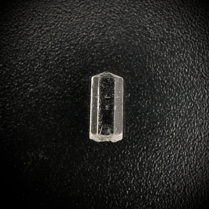 0.27 carat Burmese phenakite drill bit crystal for sale, glass clear, natural termination available at sanctuaryofstones.com photo 7