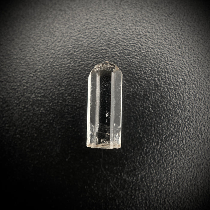 0.88 carat Burmese phenakite drill bit crystal for sale, glass clear, natural termination available at sanctuaryofstones.com photo 5
