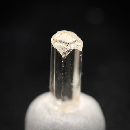 0.88 carat Burmese phenakite drill bit crystal for sale, glass clear, natural termination available at sanctuaryofstones.com photo 1