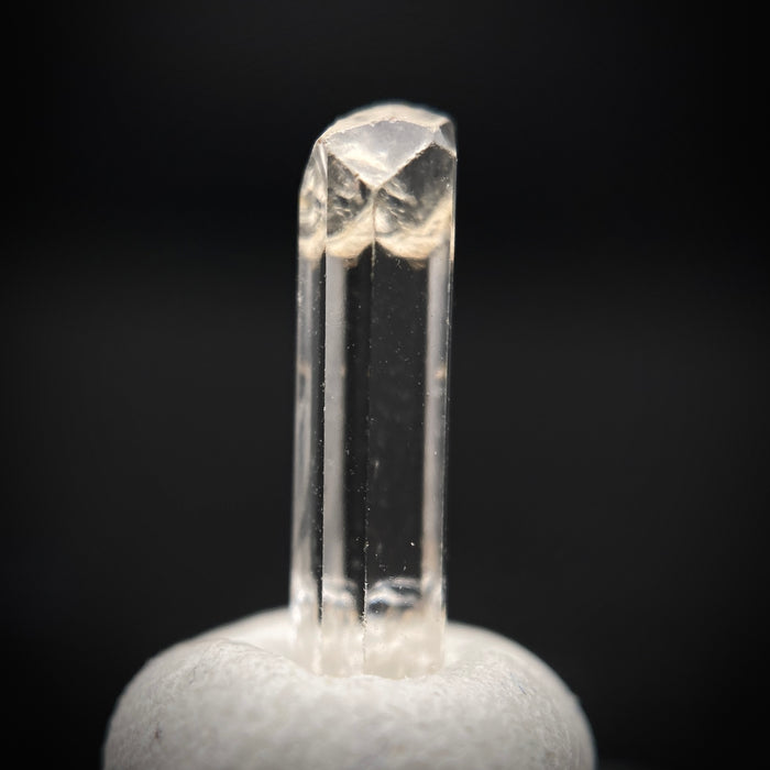 0.90 carat Burmese phenakite drill bit crystal for sale, glass clear, natural termination available at sanctuaryofstones.com photo 1