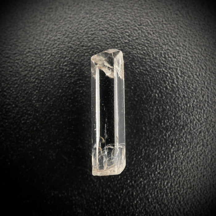 0.90 carat Burmese phenakite drill bit crystal for sale, glass clear, natural termination available at sanctuaryofstones.com photo 6