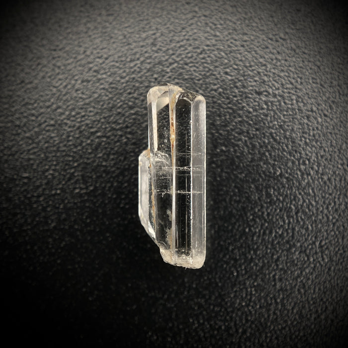 0.93 carat Burmese phenakite drill bit crystal for sale, glass clear, natural termination available at sanctuaryofstones.com photo 6