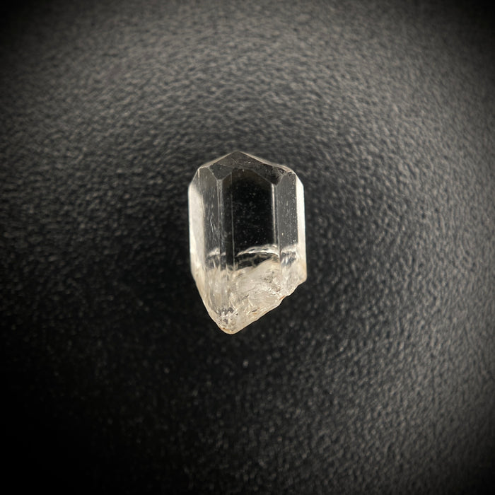 1 carat Burmese phenakite drill bit crystal for sale, glass clear, natural termination available at sanctuaryofstones.com photo 4