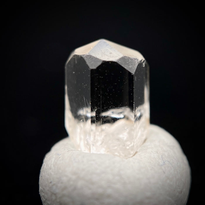 1 carat Burmese phenakite drill bit crystal for sale, glass clear, natural termination available at sanctuaryofstones.com photo 1