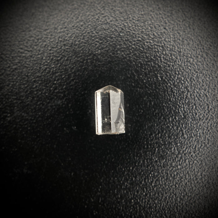 0.29 carat Burmese phenakite drill bit crystal for sale, glass clear, natural termination available at sanctuaryofstones.com photo 1
