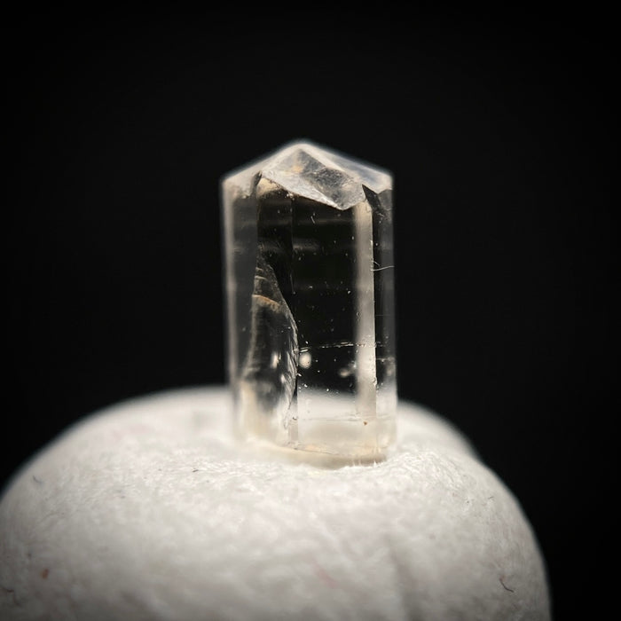 0.29 carat Burmese phenakite drill bit crystal for sale, glass clear, natural termination available at sanctuaryofstones.com photo 4