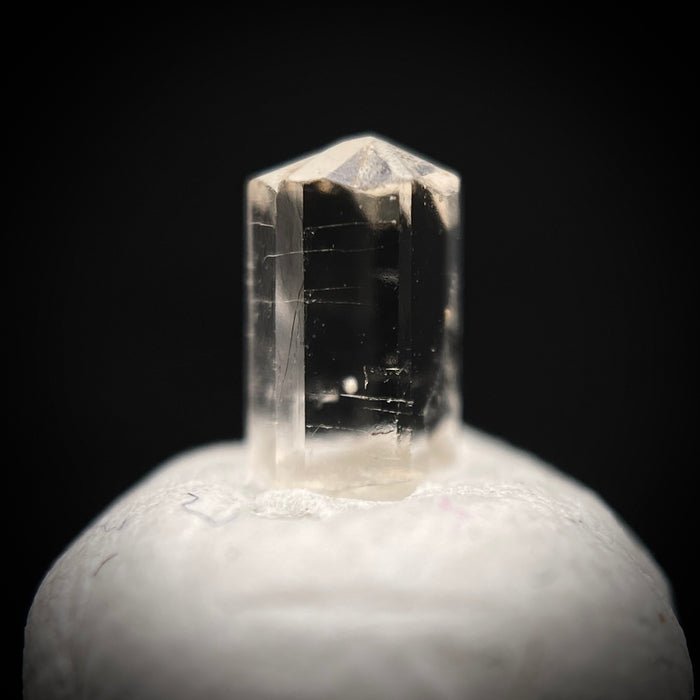 0.29 carat Burmese phenakite drill bit crystal for sale, glass clear, natural termination available at sanctuaryofstones.com photo 7