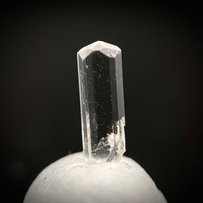 0.29 carat Burmese phenakite drill bit crystal for sale, glass clear, natural termination available at sanctuaryofstones.com photo 6