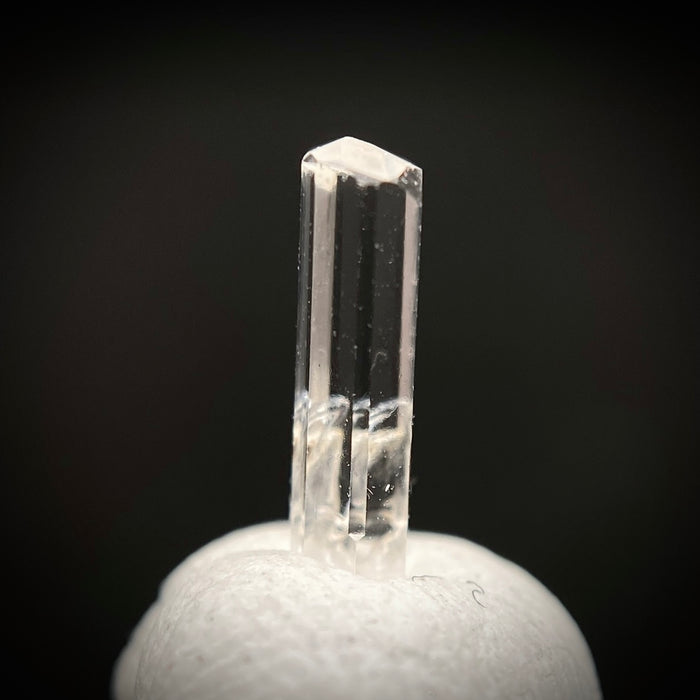 0.29 carat Burmese phenakite drill bit crystal for sale, glass clear, natural termination available at sanctuaryofstones.com photo 8